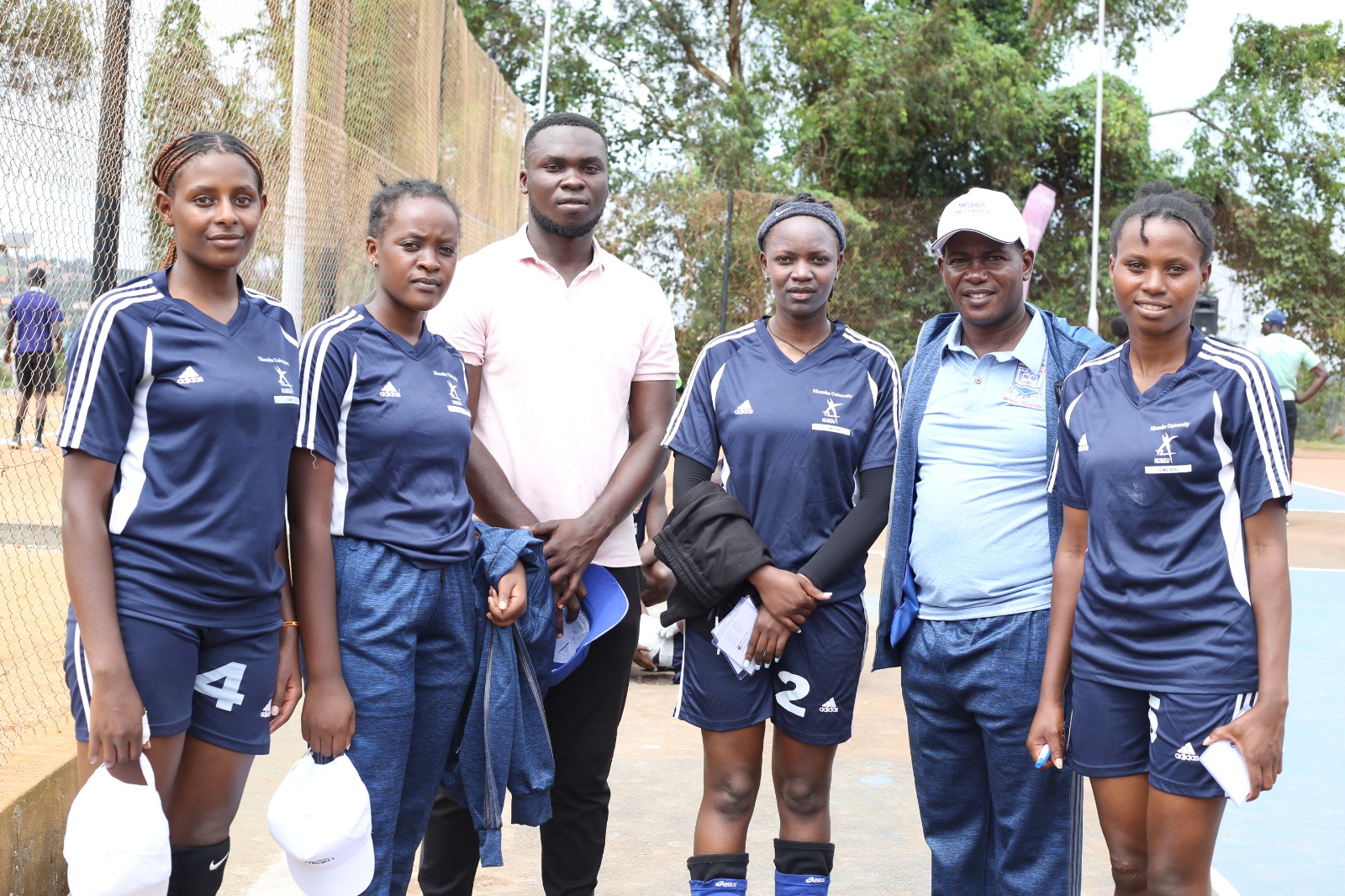 Prof. Jude Lubega with the Volleyball team moments after a lossto UCU