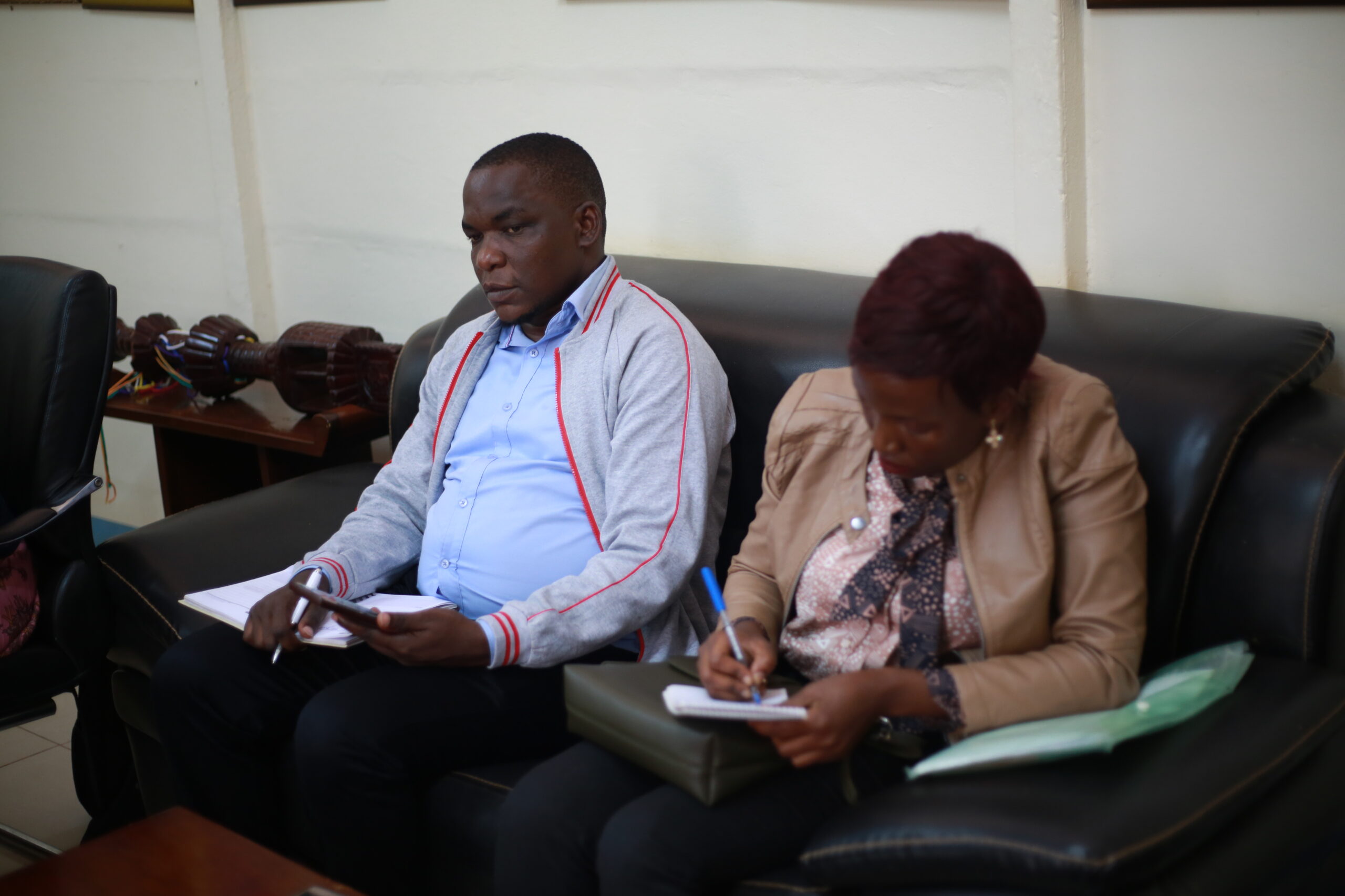 Mr. John Socrate Mugabi and Madam Teddy Namala while at the Vice Chancellor's office yesterday.