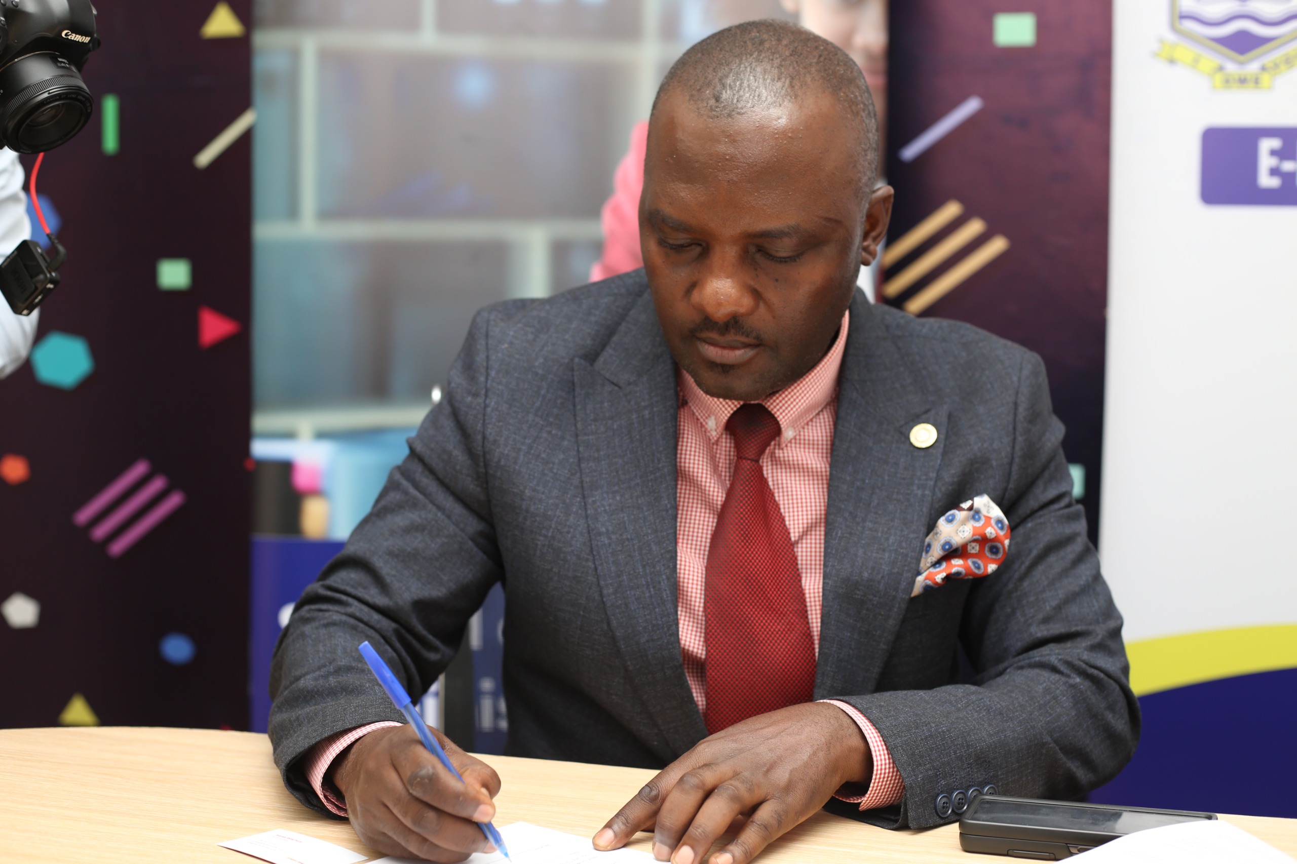 Mr. Jackson Ssonko signing an MoU at Brighter Monday- Uganda offices in Kampala on 2nd February 2024.