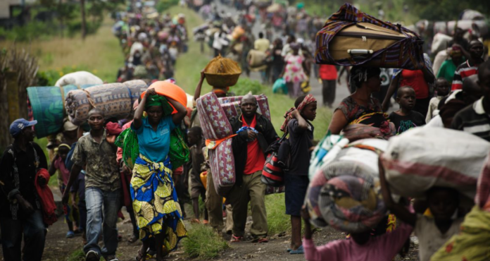 Congolese Trekking to Neighboring Uganda for Refuge //AFP