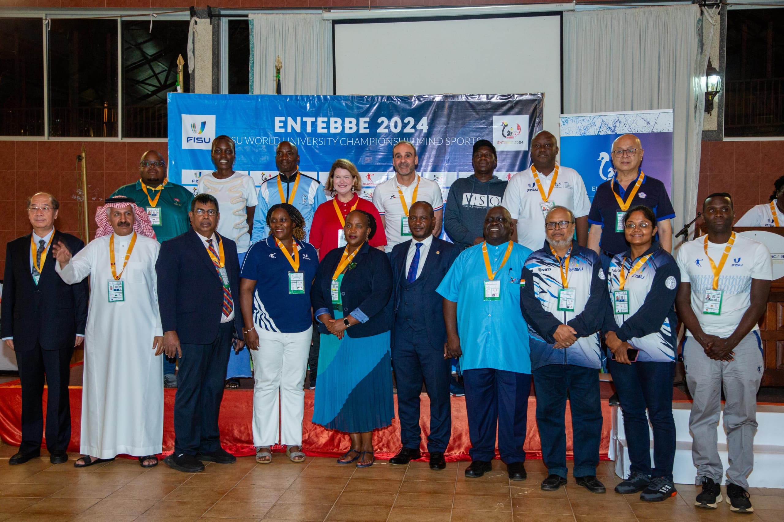 Prof. Jude Lubega (in suite) with FISU Delegates and Event Organizers