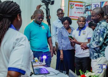 Deputy Speaker, Thomas Tayebwa while inspecting Nkumba University stall