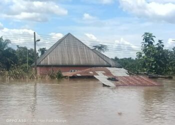A house submerged in water after heavy downpour // Courtesy Photo