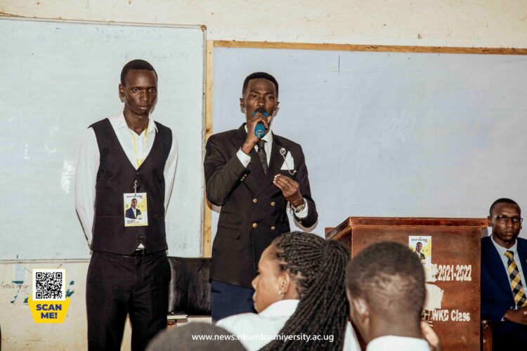 Alinda addressing students during the internal Guild Presidential Debate at TS1