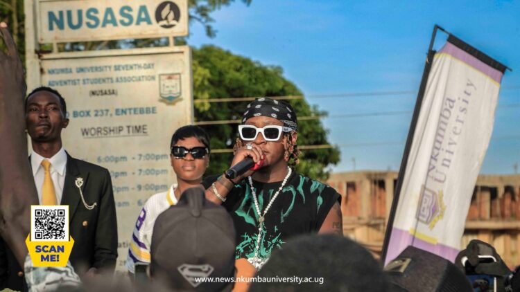 Beeni Gunter while on stage // Joshua Baleete- Nkumba News