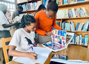 Students making last minute grasp in the while in Mpanga Library