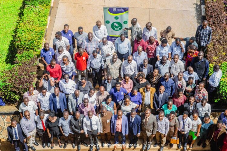 Academic staff pose for a group photo outside Mpanga library shortly after the training // Japheth Godwin Walakira