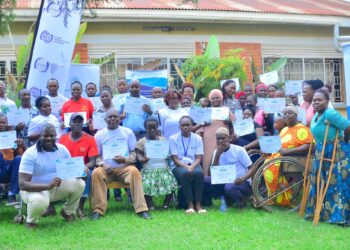 Project Beneficiaries Display Certificates of Participation Shortly after an ICT Training